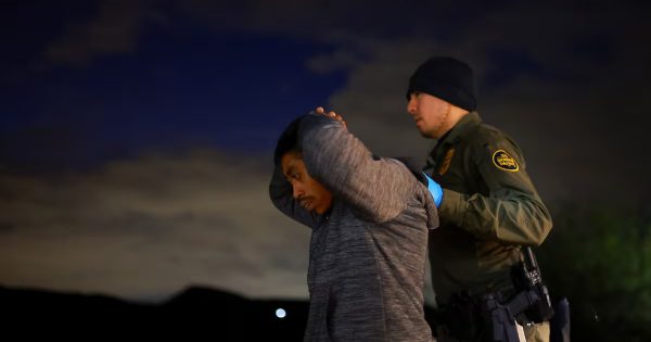 A migrant is detained by a U.S. Border Patrol agent in Sunland Park, New Mexico, on November 4, 2024. Jose Luis Gonzalez (REUTERS)